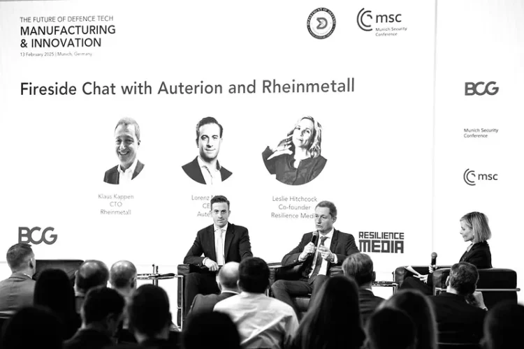 Lorenz Meier, CEO, Auterion and Klaus Kappen, CTO, Rheinmetall, on stage at The Future of Defence Tech Manufacturing & Innovation, with moderator Leslie Hitchcock, co-founder, Resilience Media. Photo credit: MSC/Alexander Körner