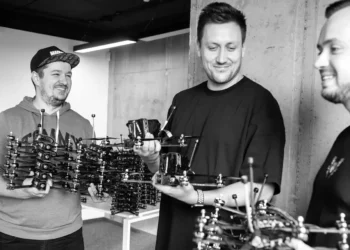 Dima Vovchuk, COO, and Nazar Bigun, CEO of Norda Dynamics, with an exec from the Lviv IT Cluster