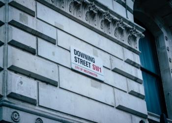a street sign on the side of a building