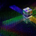 a colorful cube with a bright light coming out of it