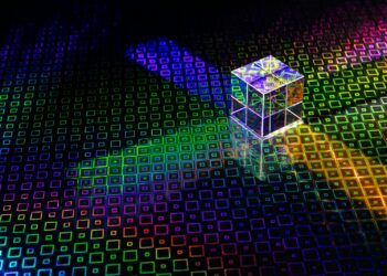 a colorful cube with a bright light coming out of it