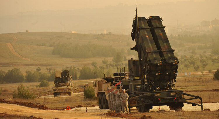 U.S. Service members stand by a Patriot missile battery in Gaziantep, Turkey, Feb. 4, 2013, during a visit from U.S. Deputy Secretary of Defense Ashton B. Carter, not shown. U.S. and NATO Patriot missile batteries and personnel deployed to Turkey in support of NATO's commitment to defending Turkey's security during a period of regional instability. (DoD photo by Glenn Fawcett/Released)