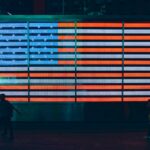 shallow focus photo of flag of United States of America neon light