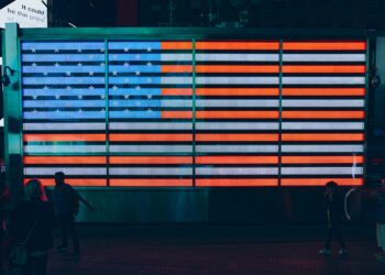 shallow focus photo of flag of United States of America neon light