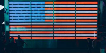 shallow focus photo of flag of United States of America neon light