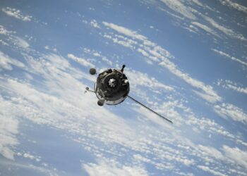 satellite flying on space