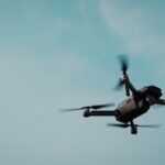 black and gray quadcopter drone