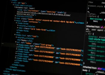 turned on monitor displaying programming language