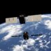 a satellite satellite flying over the earth