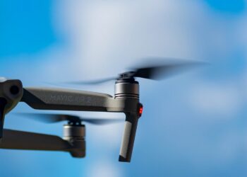 black drone in mid air