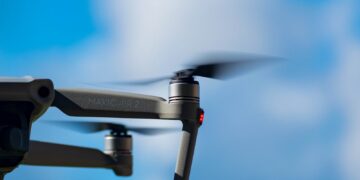 black drone in mid air