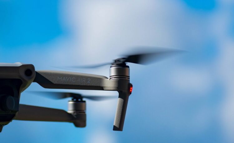 black drone in mid air