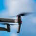 black drone in mid air