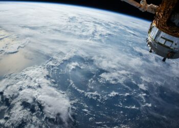 view of Earth and satellite