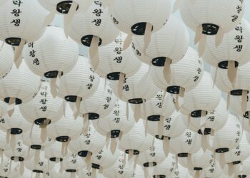 white-and-black paper lanterns during daytime