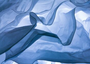 white textile on white textile