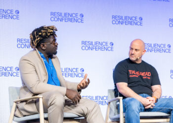 Terra CEO Nathan Nwachuku with Dominion Dynamics CEO Eliot Pence on stage at Resilience Conference